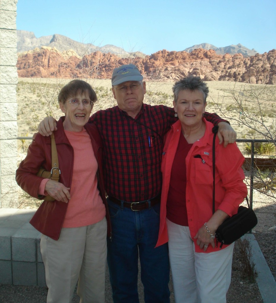 Photo of Russ and Dale standing with his sister.